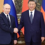 Les liens russo-chinois se trouvent actuellement à un niveau sans précédent", a dit le président russe à son hôte chinois. KEYSTONE/EPA/XINHUA / HUANG JINGWEN